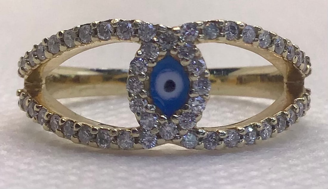 14k Yellow Gold 0.40ctw Round Brilliant Diamond Evil Eye Ring (3.5g): This elegant and timeless ring serves as a sophisticated symbol of protection, designed to look gentle and refined on the hand. Expertly handcrafted in solid 14k yellow gold, the piece features 52 nat
