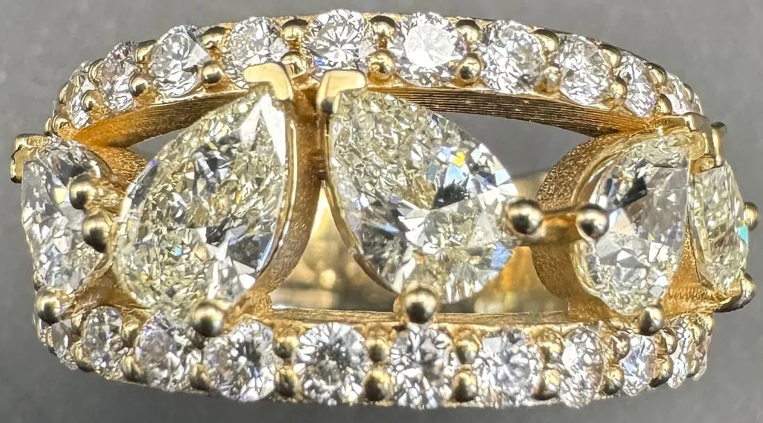 14K YELLOW GOLD NATURAL PEAR & LAB DIAMOND RING 2.55CT: 14K yellow gold ring featuring 5 pear cut natural earth-mined diamonds, H-I color, VS1 clarity, set in prong setting. Accompanied by 30 round brilliant cut lab-grown diamonds, E-F color, VS clarity, s