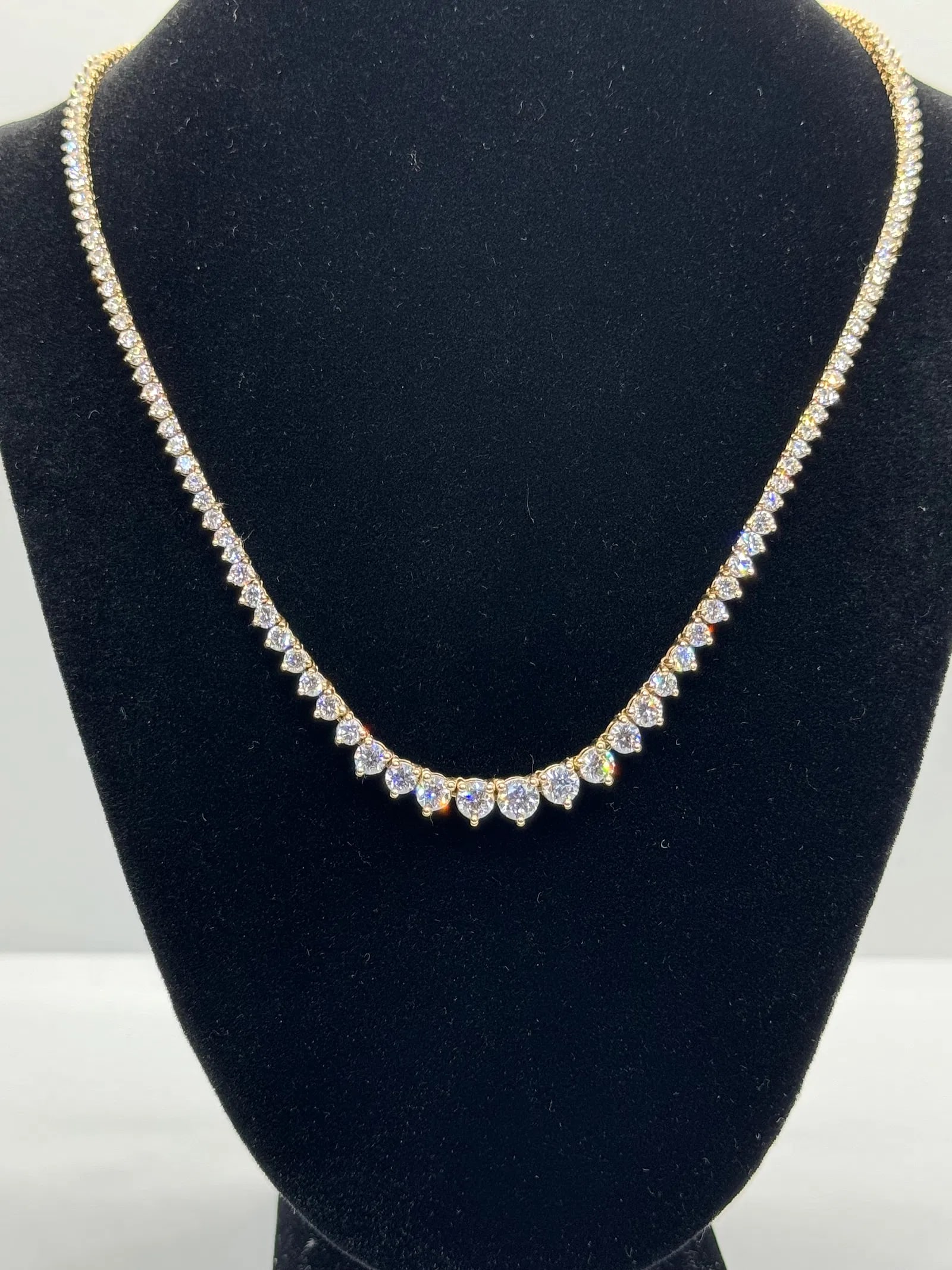 14K YELLOW GOLD LAB DIAMOND RIVIERA TENNIS NECKLACE 9.00CT: 14K yellow gold diamond riviera tennis necklace featuring 188 round brilliant cut lab-grown diamonds totaling 9.00ct, F-G color, VS clarity, set in 3 prong setting extending halfway around necklace. T