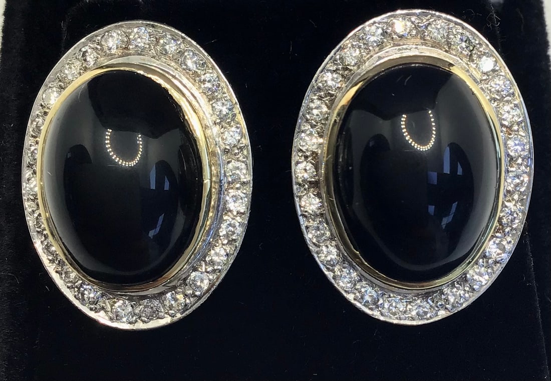 14k White & Yellow Gold 1.50ctw Diamond & Vintage Black Onyx Earrings (11.7g): Exude elegance and class with these one-of-a-kind vintage-style earrings. The design features deep black onyx centerpieces, beautifully adorned with a halo of round brilliant-cut diamonds totaling 1.5