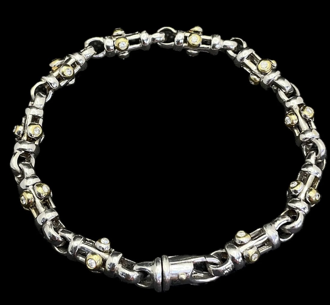 14K WHITE YELLOW GOLD EARTH-MINED DIAMOND LINK BRACELET 1.25CT: 14K white and yellow gold mens diamond link bracelet featuring 1.25ct round brilliant cut earth-mined diamonds, G-H color, VS2/SI1 clarity, set throughout. Unique edgy link design with high polish fin