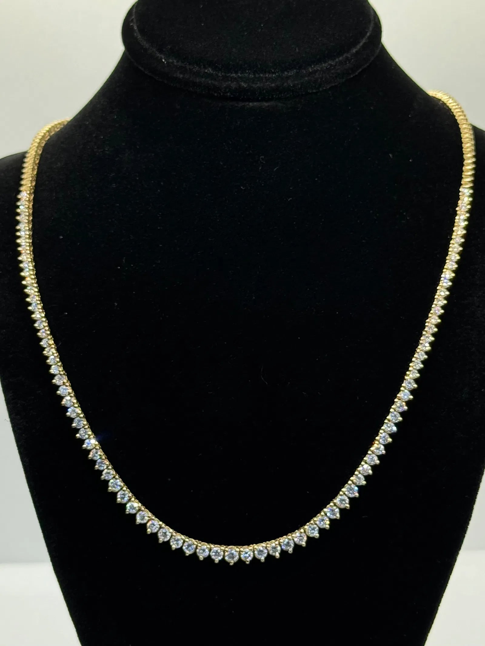 14K YELLOW GOLD LAB DIAMOND RIVIERA TENNIS NECKLACE 3.00CT: 14K yellow gold riviera tennis necklace featuring 85 round brilliant cut lab-grown diamonds totaling 3.00ct, F-G color, VS clarity, set in 3 prong setting extending halfway around necklace. Total weig