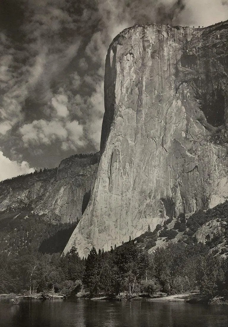 ANSEL ADAMS (B. 1902-1984): El Capitan & The Merced River Printed in colors mounted on archival board 11" x 8"
