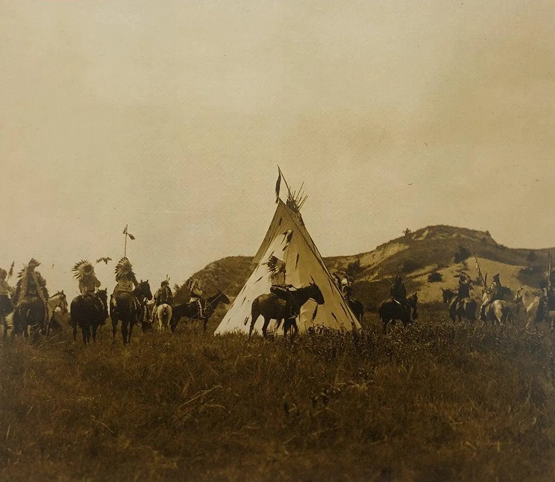 EDWARD CURTIS (1868-1952): War Preperation, Sioux, Printed in colors mounted on archival board 8" x 9"