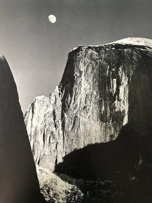 ANSEL ADAMS (B. 1902-1984): Moon and Half Dome, Yosemite National Park California Printed in colors mounted on archival board 11 1/2" x 9"