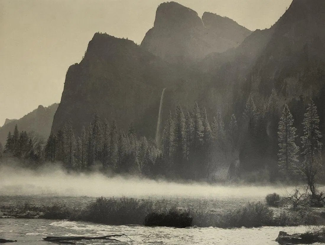 ANSEL ADAMS (B. 1902-1984): Morning Mist at the Gates of the Valley Printed in colors mounted on archival board 7 3/4" x 10"