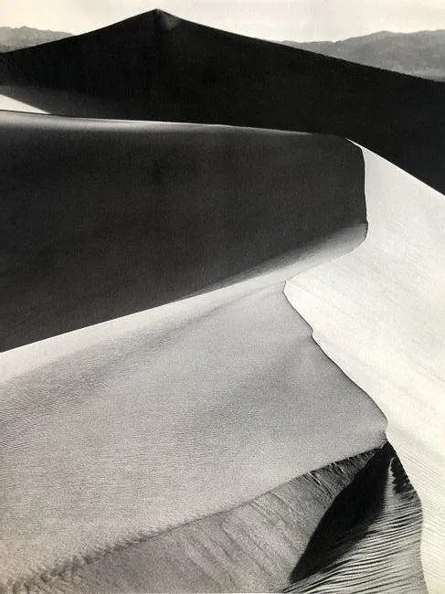 ANSEL ADAMS (B. 1902-1984): Sand Dunes, Sunrise, Death Valley National Monument, California Printed in colors mounted on archival board 11 1/2" x 9"