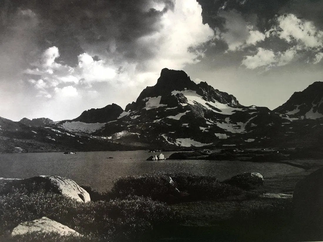 ANSEL ADAMS (B. 1902-1984): Banner Park, Thousand Island Lake, Sierra Nevada, California Printed in colors mounted on archival board 10" x 13"