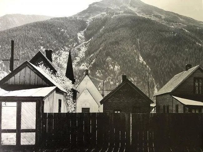 ANSEL ADAMS (B. 1902-1984): Silverton, Colorado Printed in colors mounted on archival board 11 1/2" x 14 1/2"