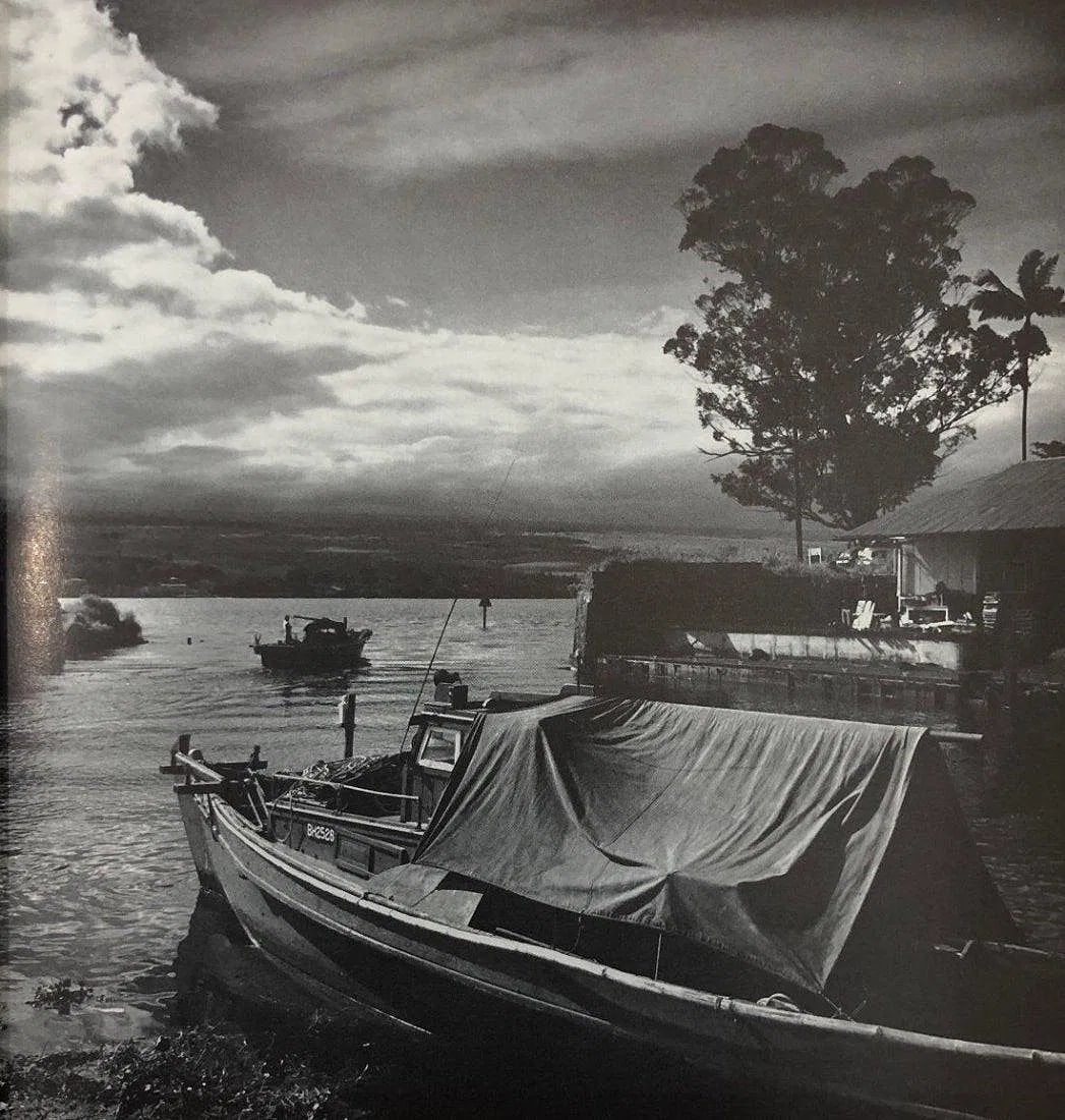 ANSEL ADAMS (B. 1902-1984): Sunrise, Hilo Harbor, east coast, Hawaii Printed in colors mounted on archival board 8 1/2 "x 8"