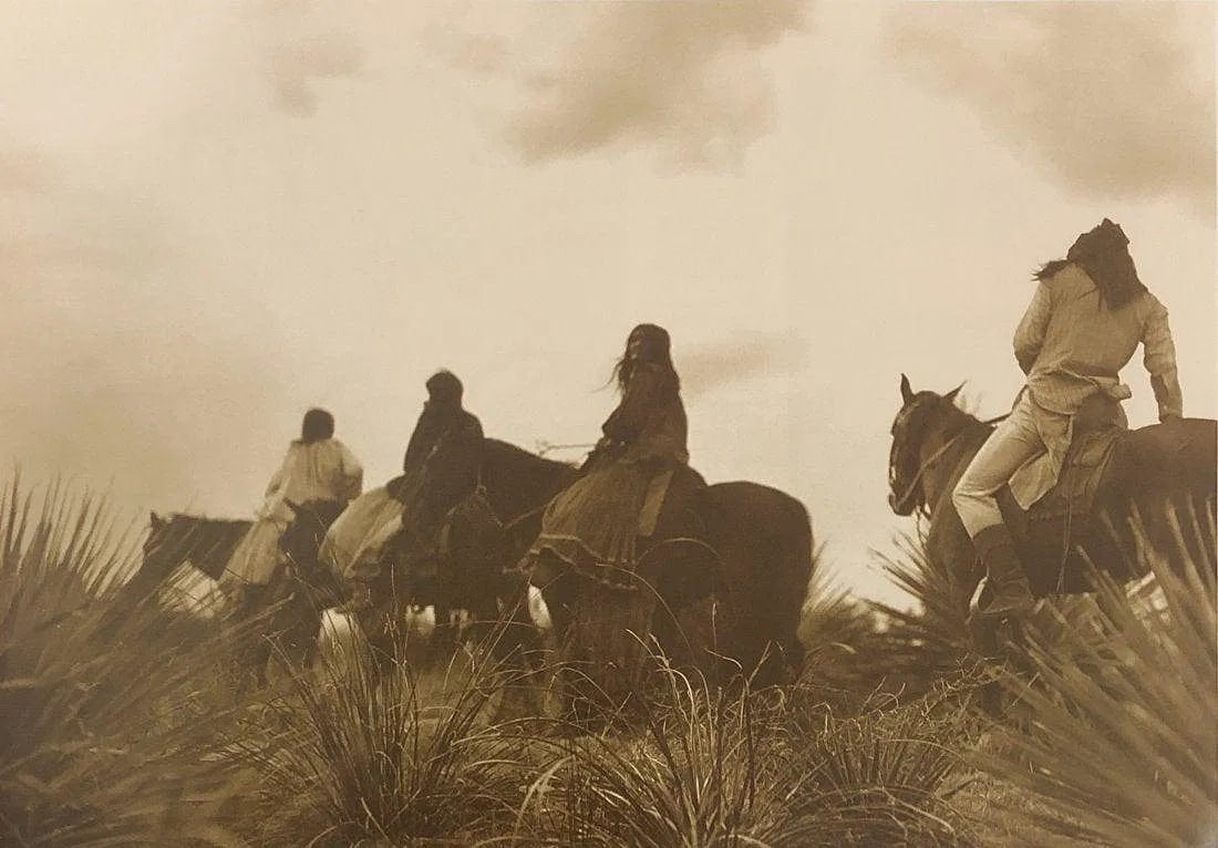 EDWARD CURTIS (1868-1952): The Storm Apache Printed in colors mounted on archival board 9 1/2" x 13 1/2"