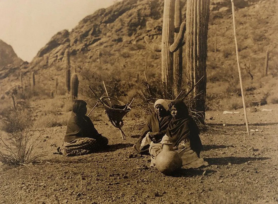 EDWARD CURTIS (1868-1952): Three Qahatika Women, Arizona, Printed in colors mounted on archival board 8" x 10 3/4"