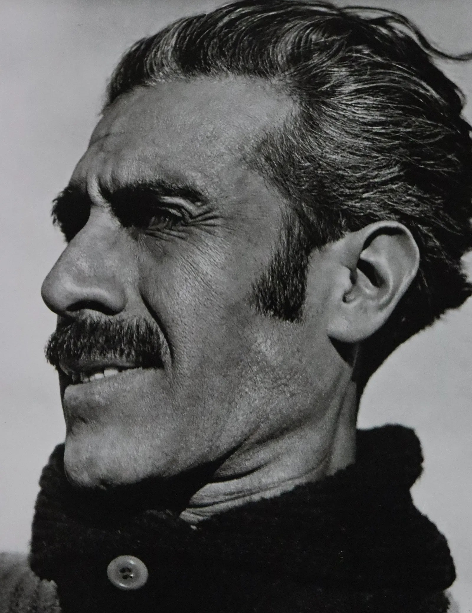 EDWARD WESTON (1886-1958): Portrat of a Man Printed in colors mounted on archival board 9" x 7"