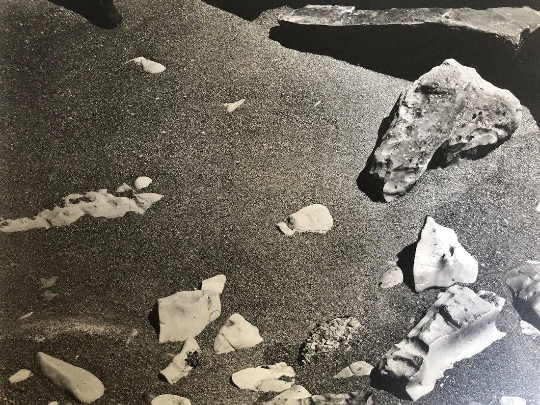 EDWARD WESTON (1886-1958): Rocks and Pebbles, Point Lobos, Printed in colors mounted on archival board 7 1/2" x 9 1/2"