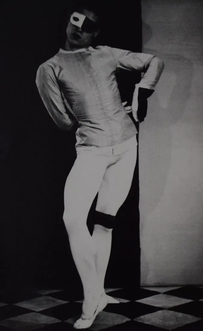 MAN RAY (1890-1976): Serge Lifar Printed in colors mounted on archival board 10 3/8" x 6 1/2"