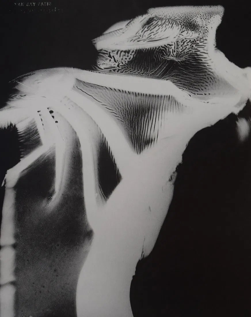 MAN RAY (1890-1976): Rayograph Printed in colors mounted on archival board 10 3/8" x 8"