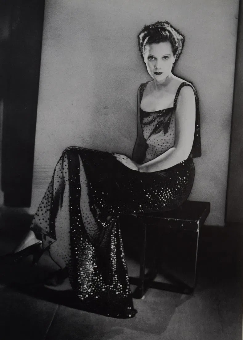 MAN RAY (1890-1976): Dress by Elsa Schiaparelli (solarized), Printed in colors mounted on archival board 10 1/2" x 7 1/2"