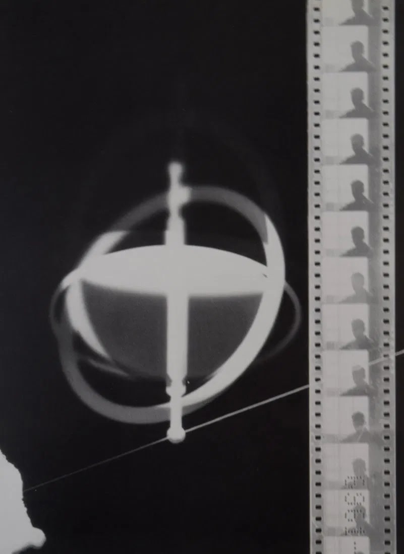 MAN RAY (1890-1976): Rayograph (film & gyroscopre), Printed in colors mounted on archival board 10 3/8" x 7 1/4"