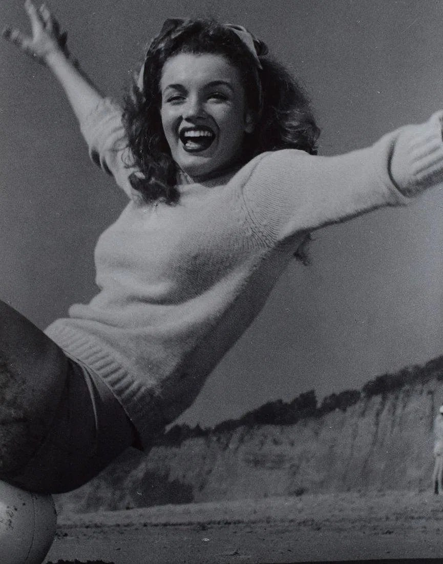 ANDRE De DIENES (1919-1985): Marilyn Monroe, Printed in colors mounted on archival board 12" x 9 1/2"
