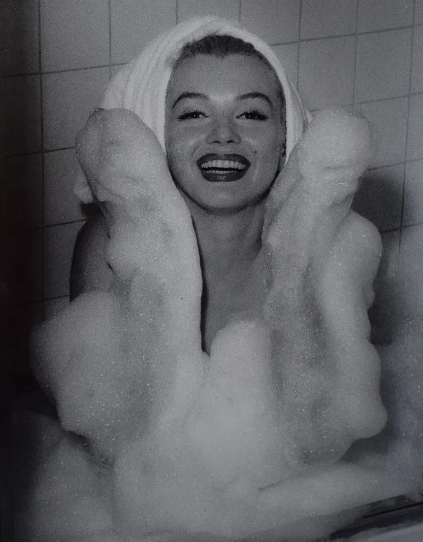 ANDRE De DIENES (1919-1985): Marilyn Monroe, Printed in colors mounted on archival board 12" x 9 1/2"