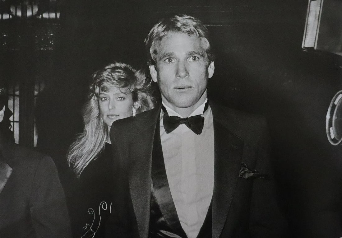 UNKNOWN PHOTOGRAPHER: Ryan O'Neal with girlfriend Farrah Fawcett, Studio 54, Printed in colors mounted on archival board 7 1/2" x 11 1/4"