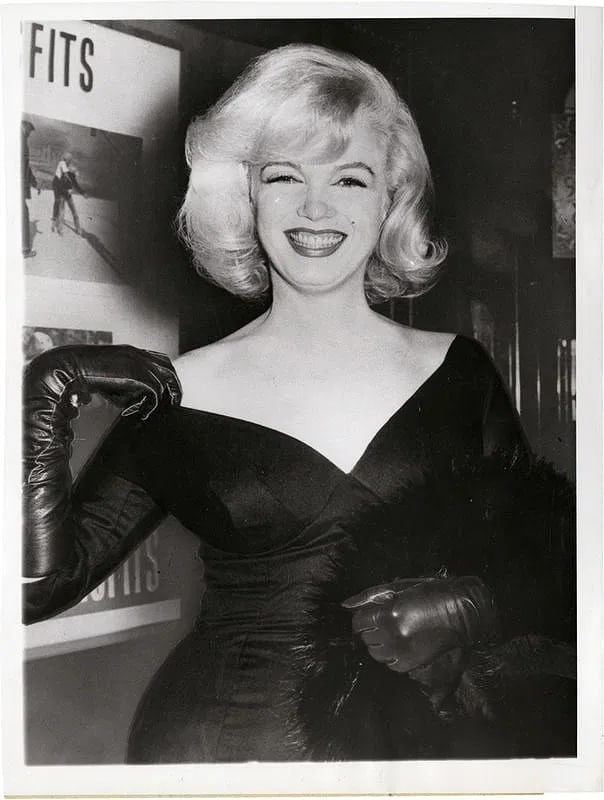 Marilyn Monroe Photo: Measures 8x 10 inches photographic print , mounted to archival board