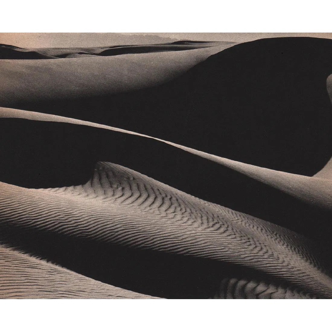 EDWARD WESTON (AMERICAN) PRINT ON PAPER: Edward Weston (American) Print on Paper. Dunes, Oceano. Printed in USA in 1940s. Measures 6.50 x 5.50 inches.