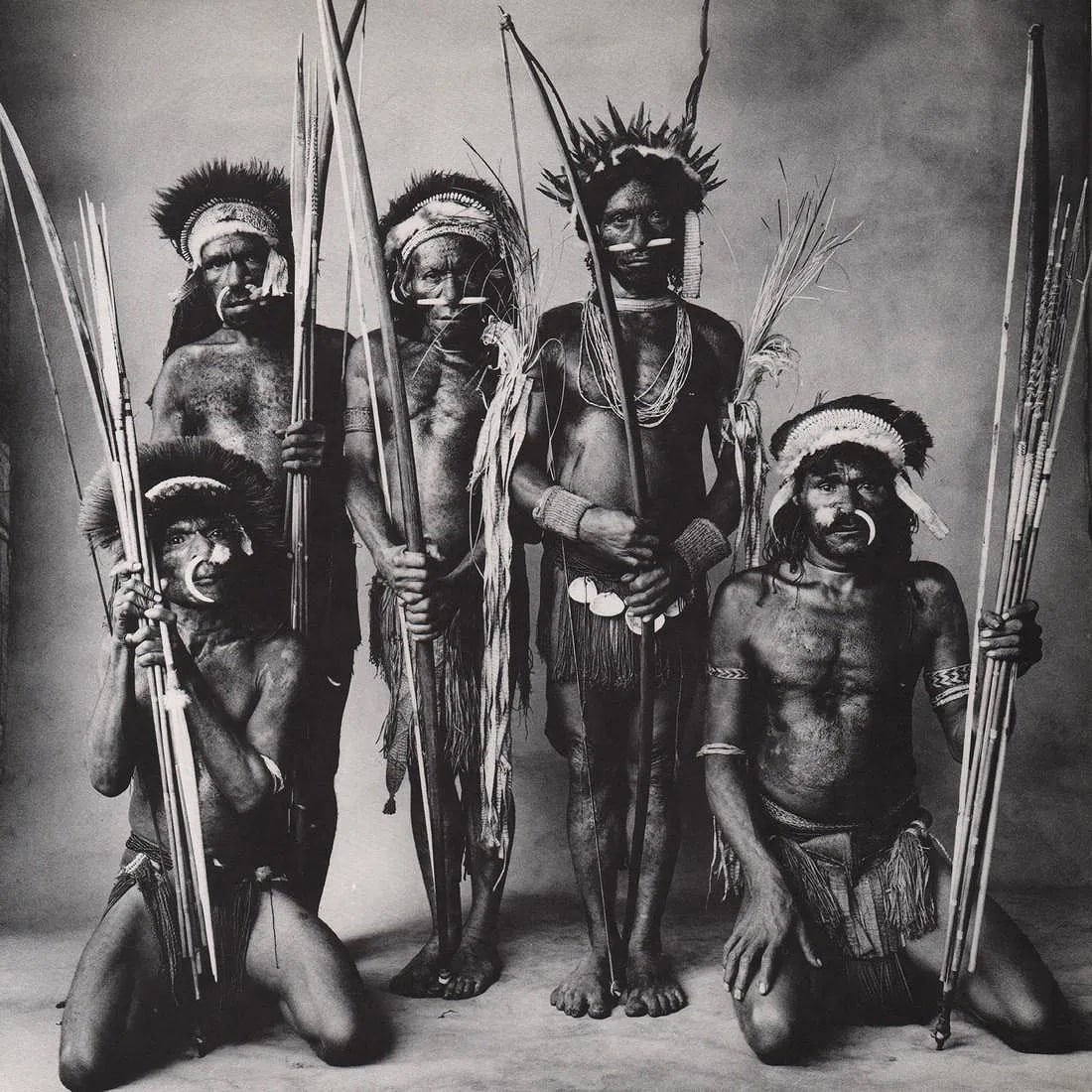 IRVING PENN (AMERICAN) PRINT ON PAPER: Irving Penn (American) Print on Paper. Okapa Warriors. Printed in USA in 1974. Measures 10.00 x 10.00 inches. Photoengraving.
