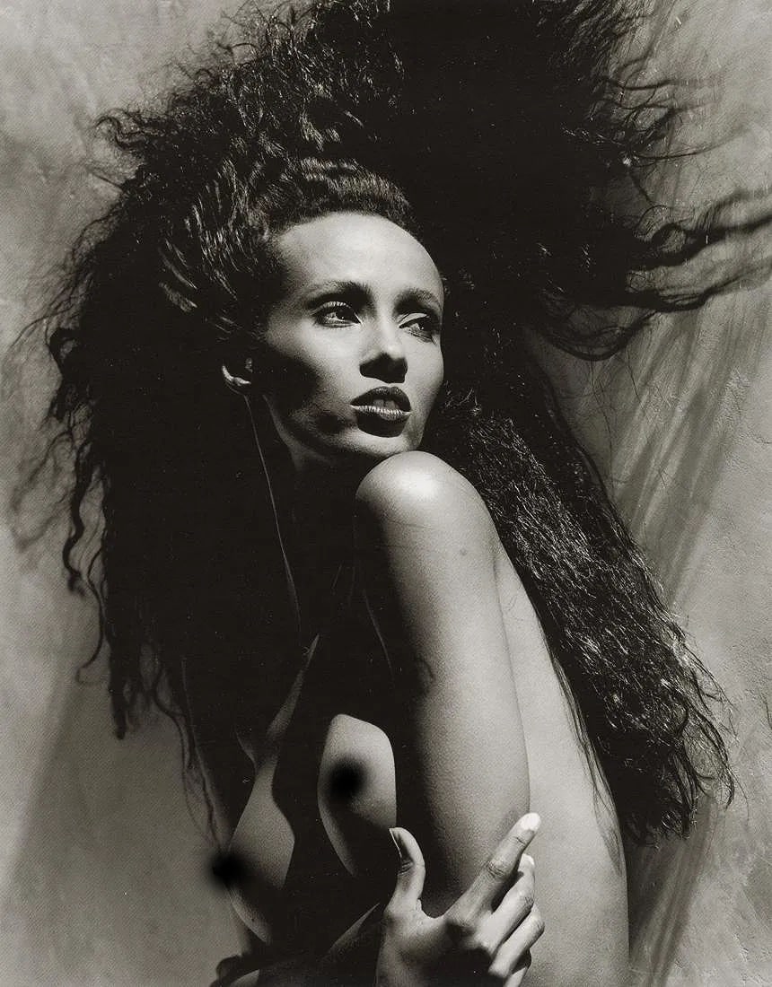 GREG GORMAN (AMERICAN) PRINT ON PAPER: Greg Gorman (American) Print on Paper. Iman, Los Angeles (1988). Printed in Germany in 2002. Photo Litho. Measures 7.40 x 9.45 inches.
