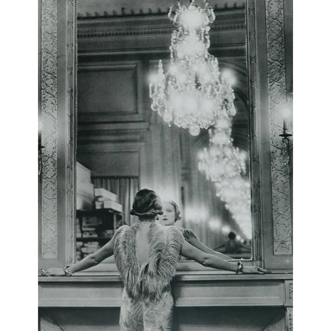 ALFRED EISENSTAEDT (AMERICAN) PRINT ON PAPER: Alfred Eisenstaedt (American) Print on paper. A Model in the Atelier of Molyneux in Paris (1934). Printed in Switzerland in 1960s. 12.25 x 12.50 inches.