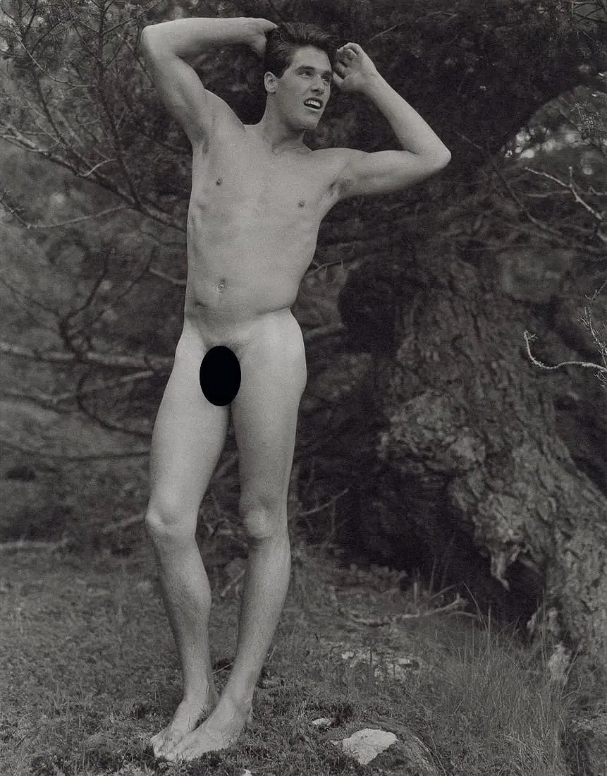 BRUCE WEBER (AMERICAN) PRINT ON PAPER: Bruce Weber (American) Print on Paper. Rob Facing Mt. Olympus National Park, Washington (1990). Printed in USA in 1990. Measures 7.35 x 9.35 inches.