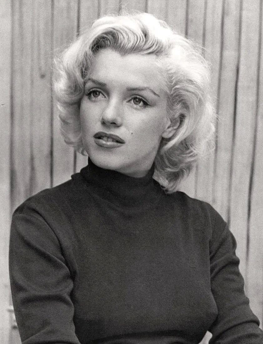 ALFRED EISENSTAEDT (AMERICAN) PRINT ON PAPER: Alfred Eisenstaedt (American) Print on paper. Marilyn Monroe, Chicago (1953). Printed in Japan in 1970s. 12.50 x 9.00 inches. Photogravure.