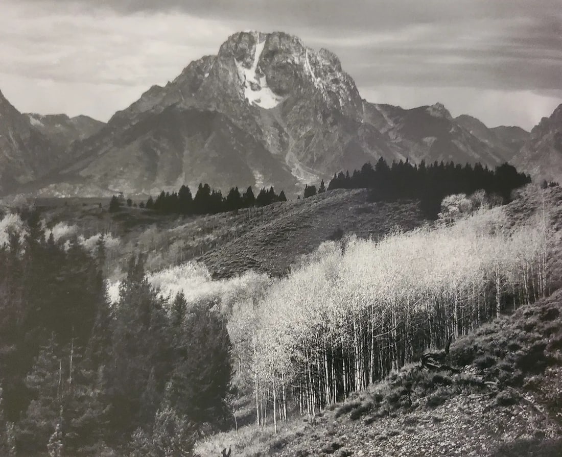 ANSEL ADAMS (AMERICAN) PRINT ON PAPER: Ansel Adams (American). Mount Moran, Autumn, Grand Teton National Park, Wyoming (1948). Printed in Italy in 2007 and Published by Little, Brown, and Company. Measures 7.50 x 6.00 inches. Duotone.