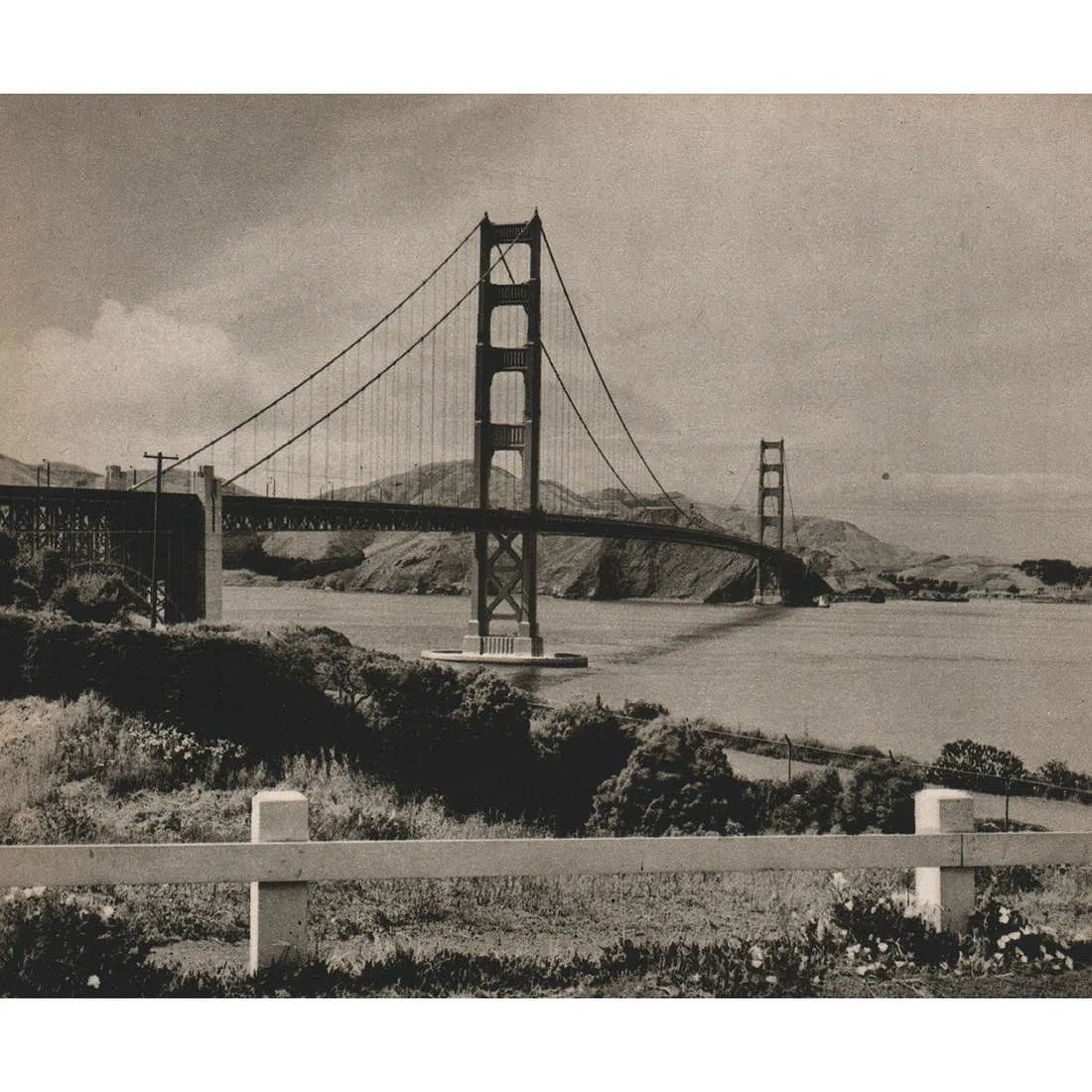 JOSEF MUENCH (AMERICAN) PRINT ON PAPER: Josef Muench (American) Print on Paper. Golden Gate Bridge, San Francisco, California. Printed in USA in 1940s. Measures 4.75 x 5.75 inches. Gravure.