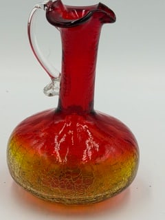 Mid-Century Italian Red & Amber Art Glass Ewer, Controlled Bubble: Mid-century Italian art glass ewer featuring a vibrant red body transitioning to amber at the base, with a crackle or controlled bubble effect throughout. The piece is formed with a tall cylindrical n