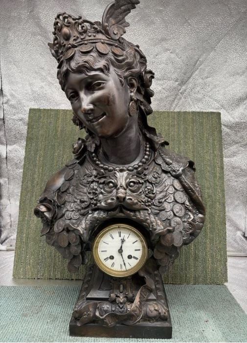 Arthur Waagen “Time Is Money" Bronze Bust Clock Figural 26" Working: Impressive figural bust clock after Arthur Waagen, titled “Time Is Money,” featuring a richly detailed classical female figure adorned with coins, jewelry, and ornate headdress. The