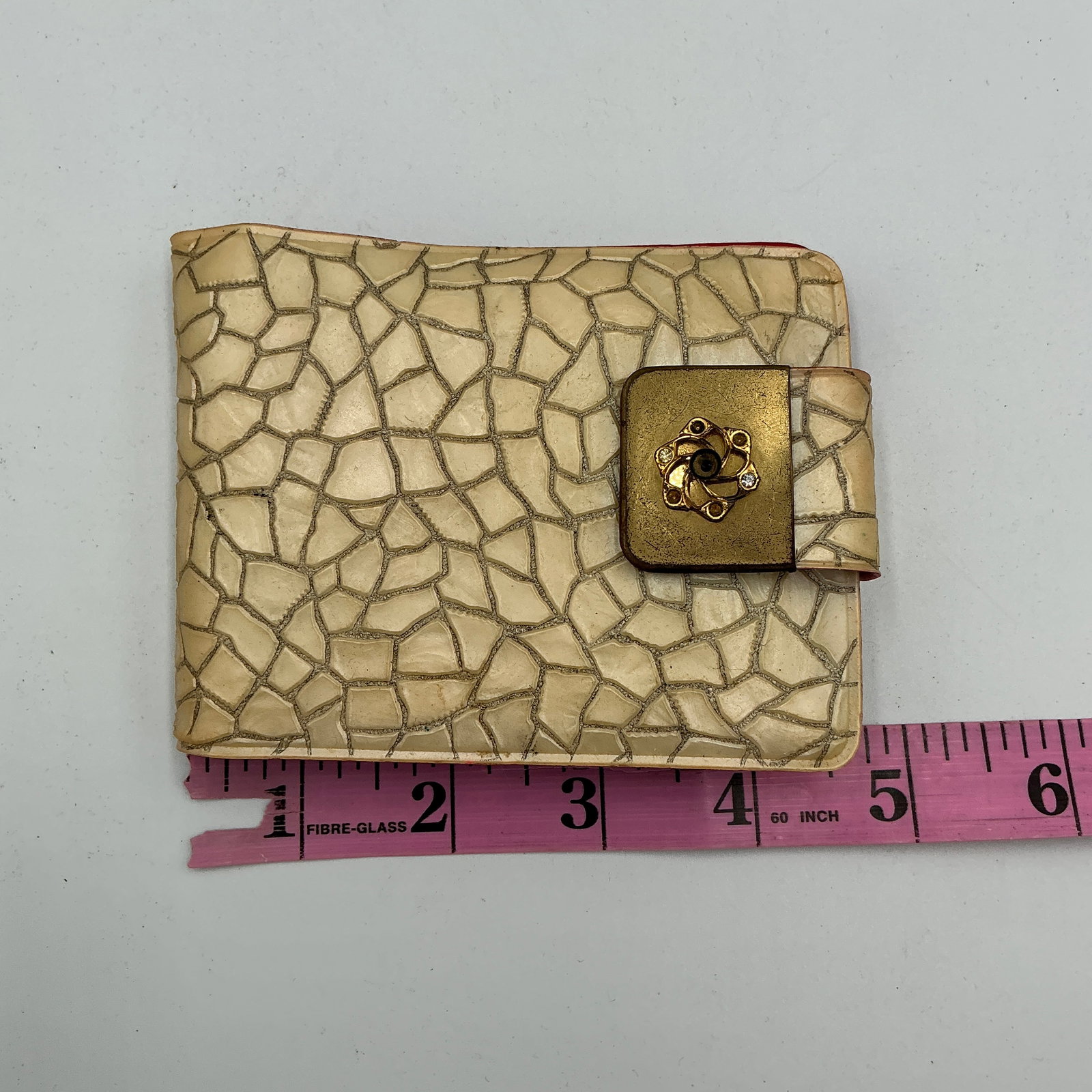 Vintage Mini Photo Album Wallet Mosaic Lucite Cover w/ Clasp + Photos Nevada MO: Unique vintage mini photo album / photo wallet featuring a cream mosaic-style lucite (or celluloid) exterior and decorative gold-tone clasp closure with rhinestone accents.The interior is bright red p