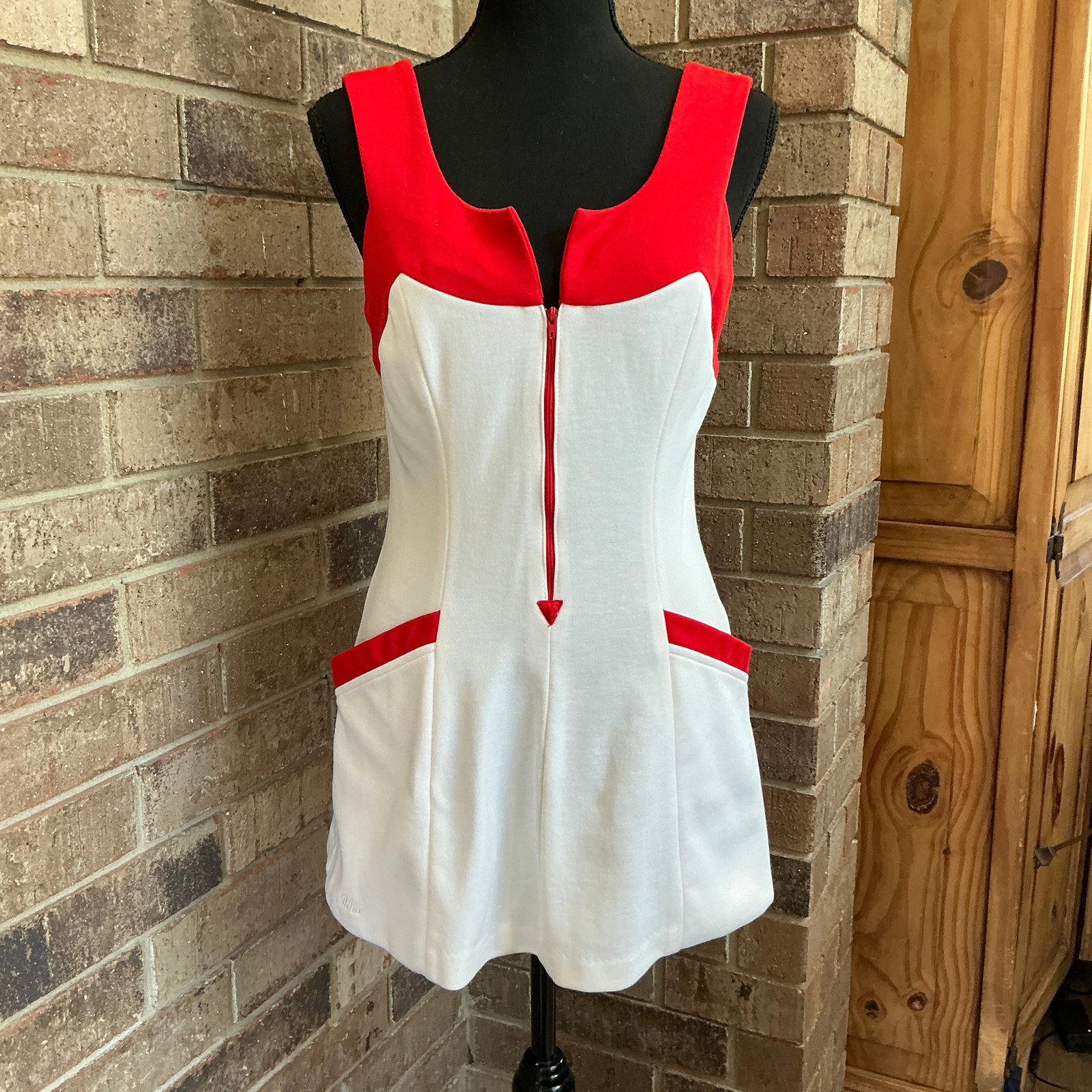 Vintage 60s Mod Mini Dress Red White Colorblock Go Go A Line Zip Front Tennis Style: Vintage late 1960s mod mini dress by Riha Santa Barbara.Features bold red and white colorblock design, front zipper detail, and classic A-line silhouette. Structured fit with wide straps and retro spo