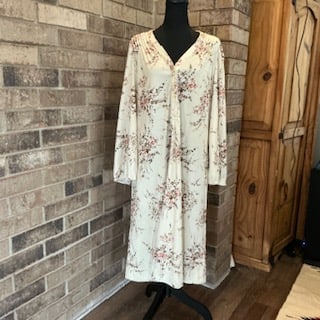 Vintage 1970s Cream Floral Dress Boho Peasant Style Long Sleeve: Beautiful vintage 1970s dress in a soft cream tone with an all-over delicate floral print in muted pinks and browns. Features a flattering V-neckline with button detail, gently gathered shoulders, and
