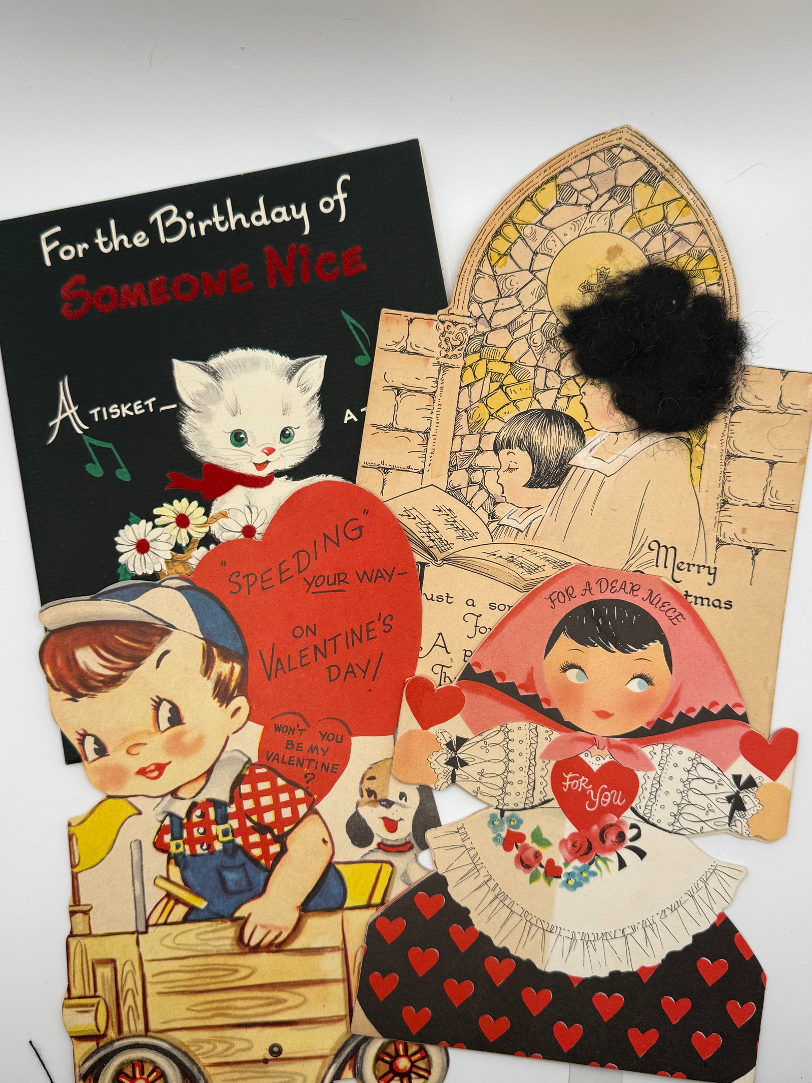 5 Vintage Greeting Cards & Valentines – Die-Cut Boy Wagon, Niece Valentine, Kitten Birthday &: Collection of five vintage greeting cards and Valentines featuring a mix of die-cut designs and illustrated themes from the mid-20th century.Included:Die-cut Valentine of boy in wagon with dog, readin