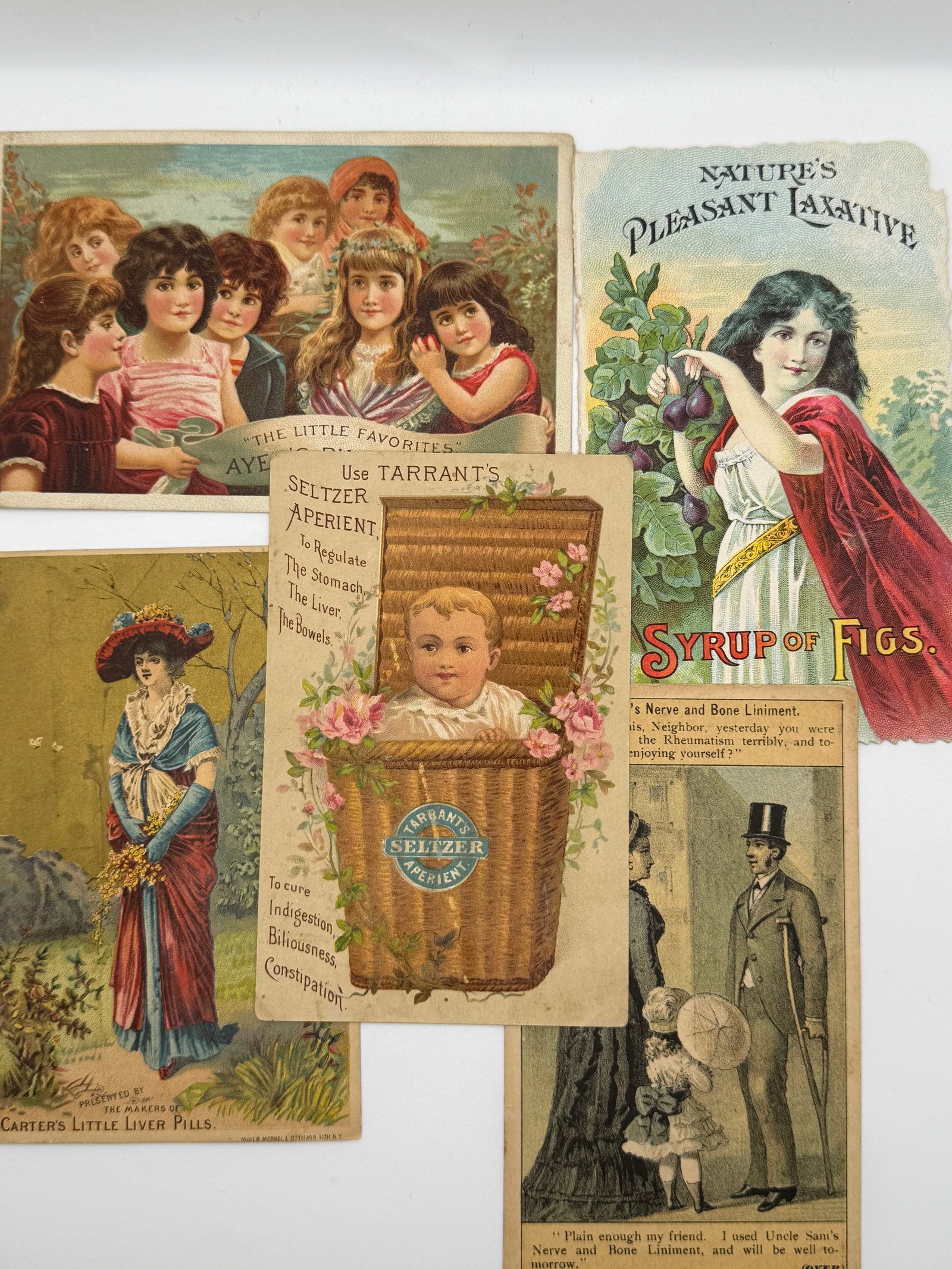 5 Antique Victorian Trade Cards Syrup of Figs Tarrant’s Seltzer Carter’s Liver Pills Lot: Charming lot of 5 antique Victorian trade cards featuring colorful late 19th century advertising:Nature’s Pleasant Laxative – Syrup of Figs (beautiful woman with fruit)Tarrant’s Seltzer Aperient