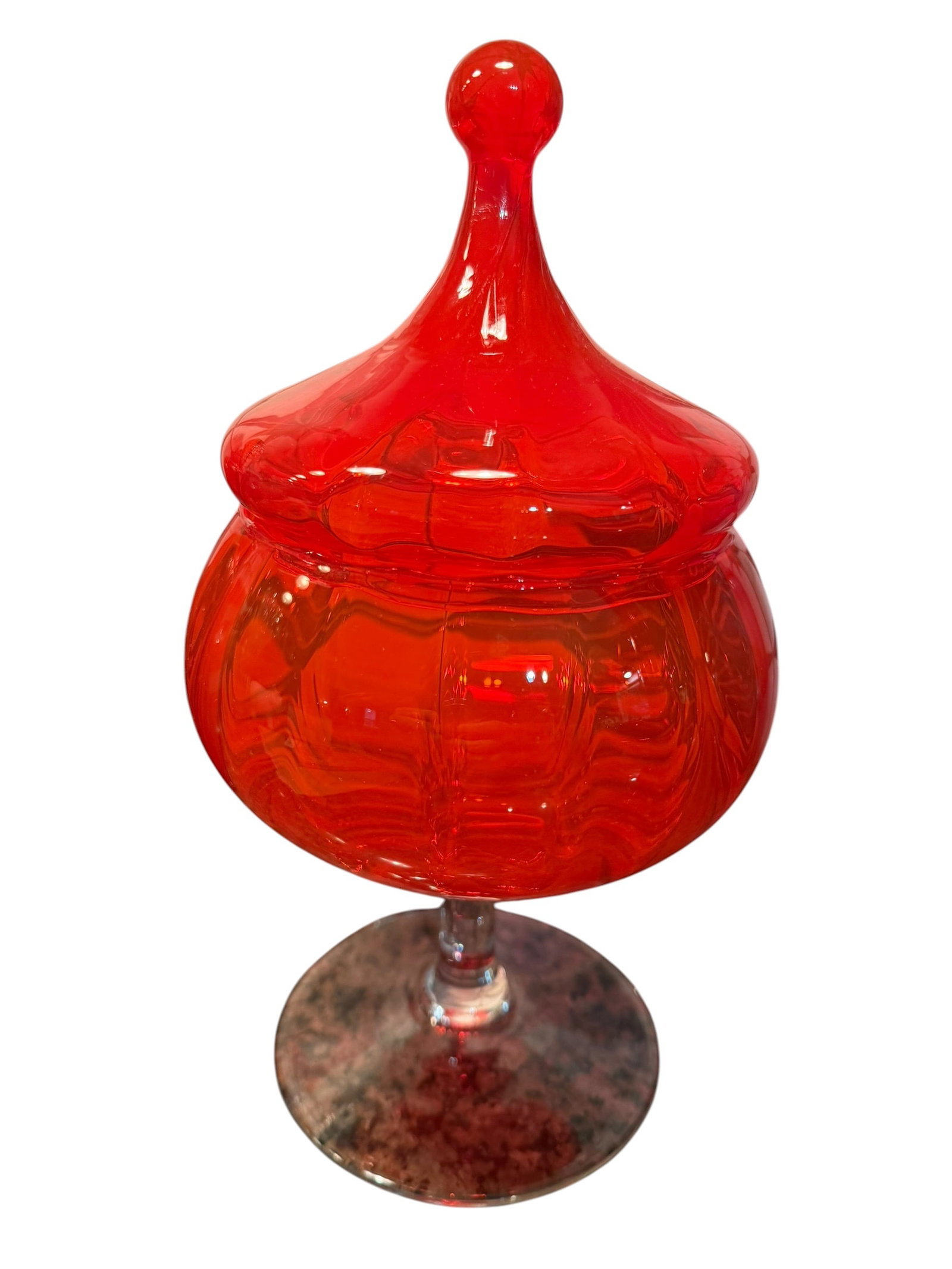Vintage Ruby Red Art Glass Covered Compote Candy Dish – Mid-Century Pedestal Apothecary Jar: Striking vintage ruby red art glass covered compote or candy dish featuring a dramatic lidded finial top and elegant pedestal base. This vibrant translucent red glass piece displays a rich glowing col