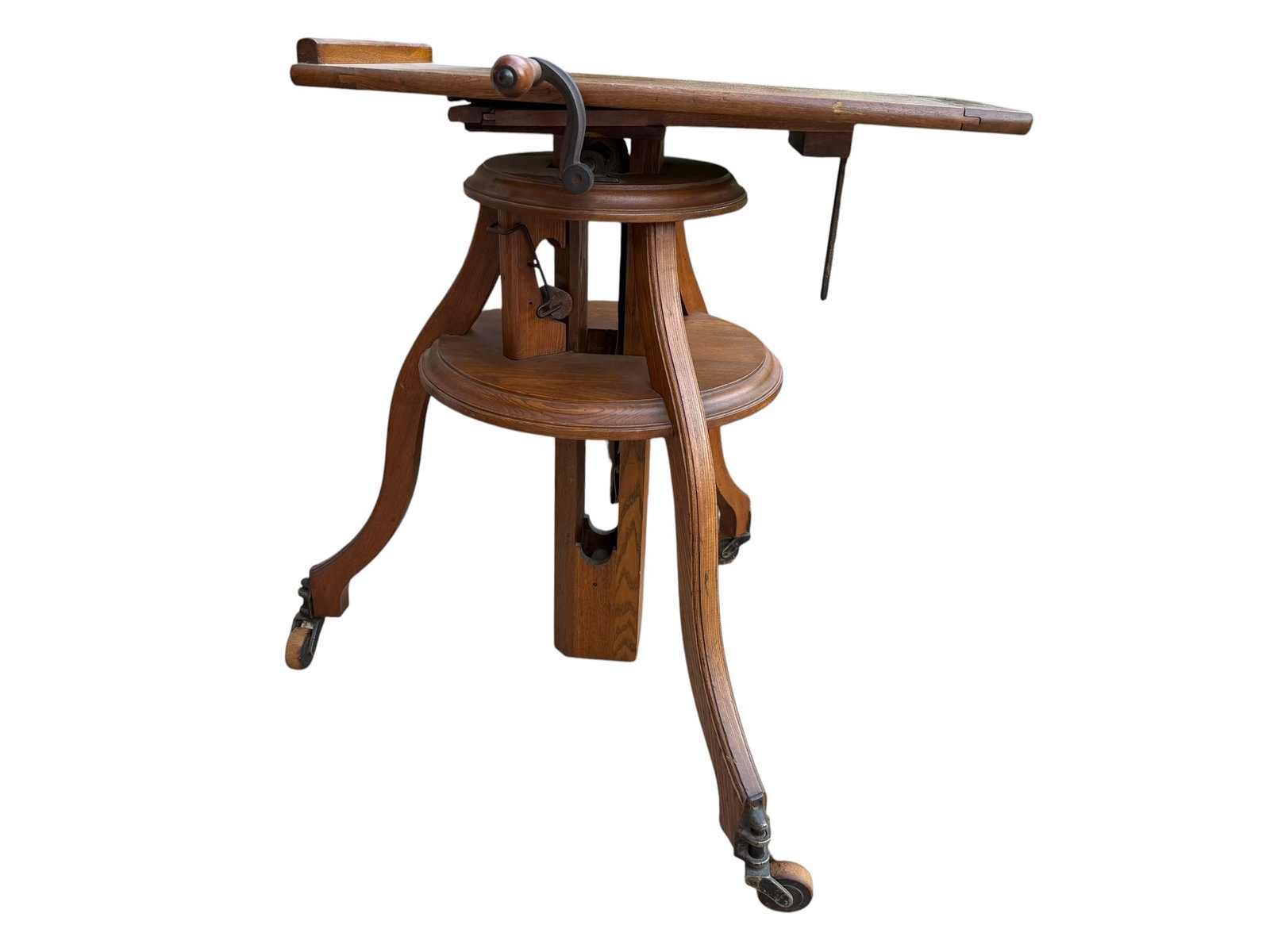 Antique Oak Adjustable Drafting Table Stand Tilting Top Crank Base Arts & Crafts: Vintage antique oak adjustable drafting table or artist’s stand featuring a tilting top and solid Arts & Crafts style base.This piece has a beautifully aged oak finish with a sturdy tripod-style bas