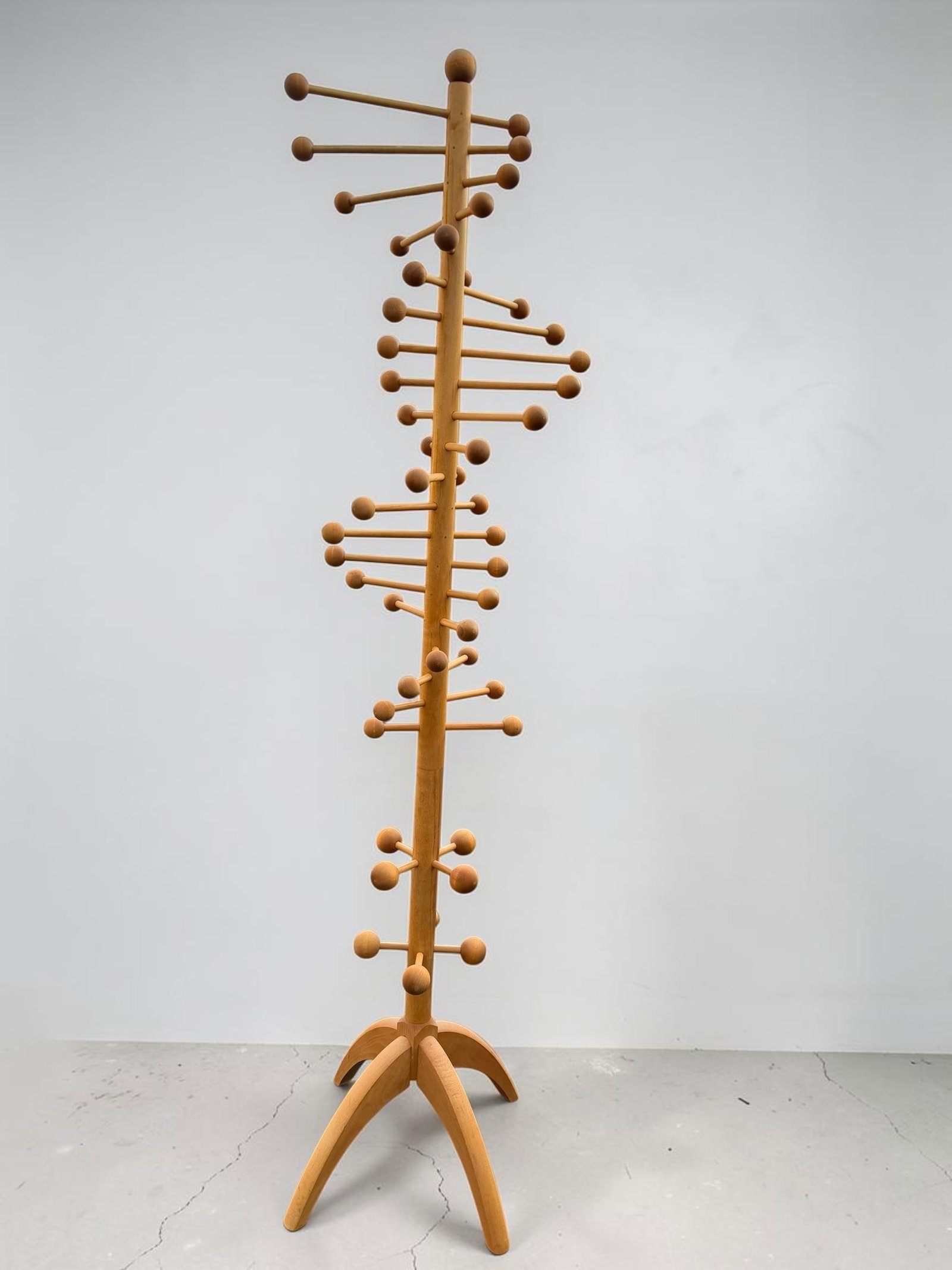 Vintage Mid-Century Modern Wooden Nanna Ditzel Double Helix Coat Rack: Exceptional mid-century modern wooden coat rack designed in the style of Nanna Ditzel, featuring an iconic double helix form inspired by the structure of the DNA molecule. This sculptural freestanding