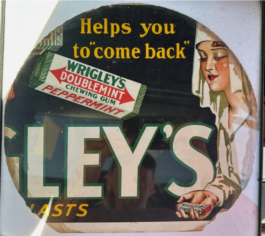 Rare WWI Era Wrigley’s Doublemint Gum Trolley Car Advertising Sign – “Helps You to Come: Rare and highly collectible World War I era Wrigley’s Doublemint chewing gum advertising sign originally used in a trolley or streetcar advertising display. This striking antique advertisement featu