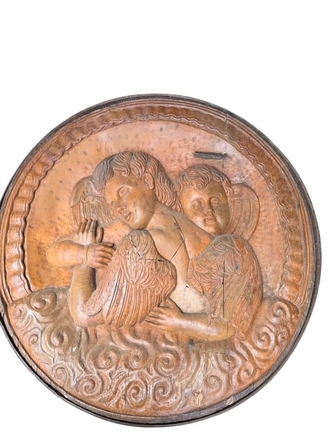 Late 1800s Monumental Carved Wooden Large Architectural Ecclesiastical Medallion 39": Large architectural ecclesiastical medallion depicting three winged cherubs emerging from stylized clouds. Hand-carved in deep relief from solid wood and mounted within an iron retaining band. Retains