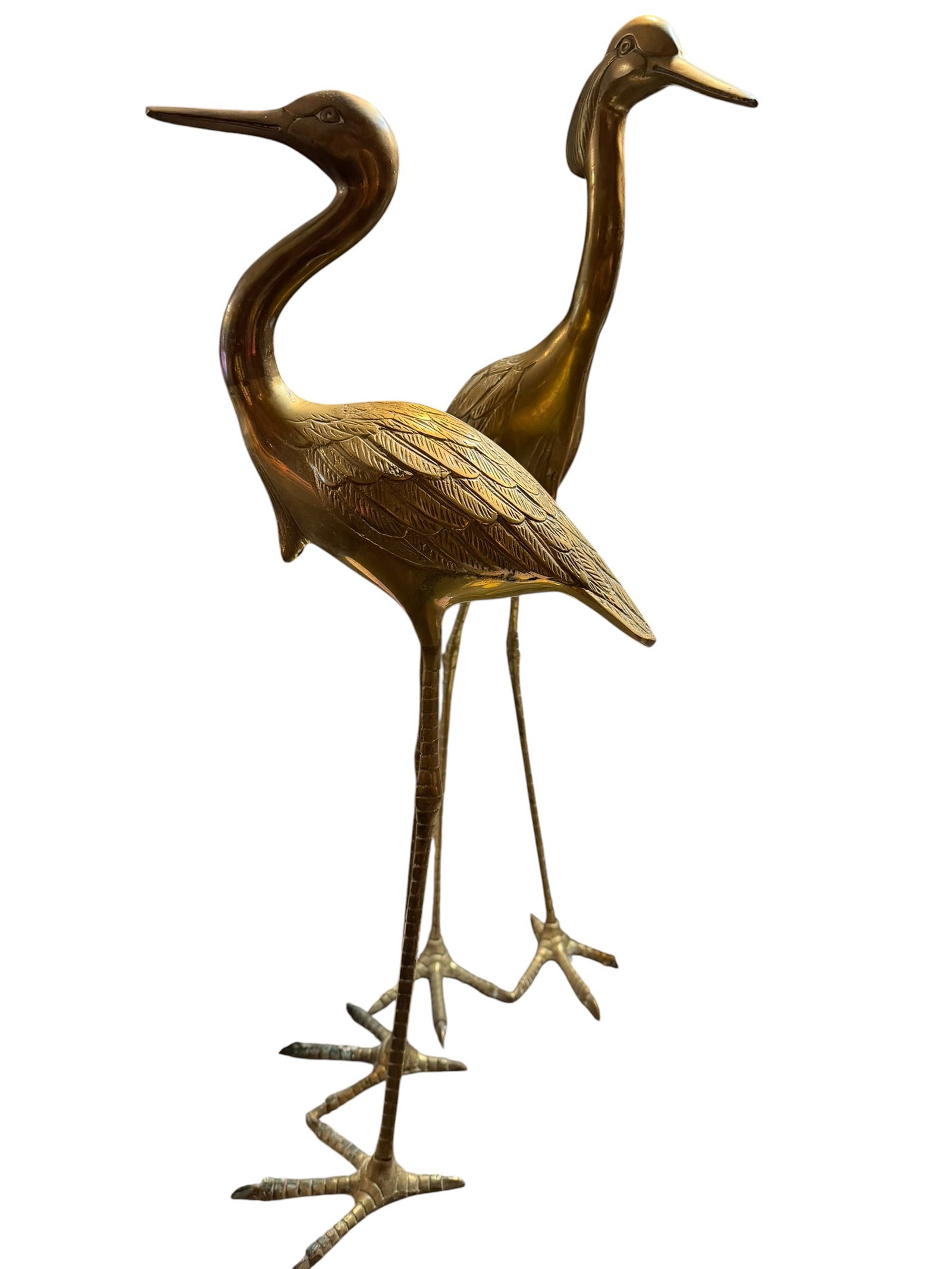 Pair of Vintage Brass Crane Sculptures, Hollywood Regency Style, 26" & 23": Elegant pair of vintage solid brass crane sculptures featuring graceful elongated necks, finely engraved feather details, and delicately cast long legs with naturalistic feet. Crafted in the Hollywood