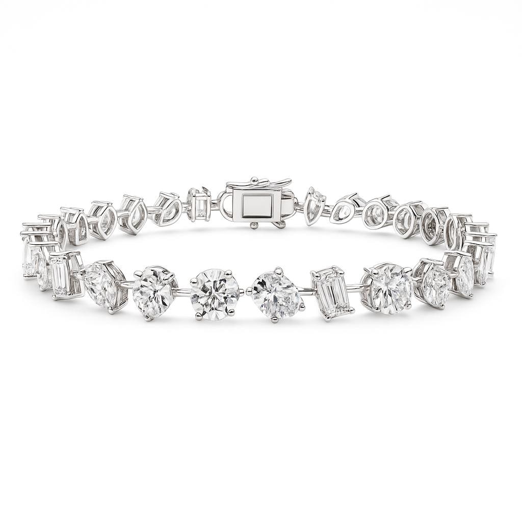 Mutli-Shape Lab Grown Diamond Tennis Bracelet 10.80 Carats E-F VVS2-VS1 14K: Multi-Shape Lab Grown tennis Bracelet featuring Round Brilliant, Oval, Emerald, Pear, & Marquise shapes weighing 10.80 Carats, in 14 Karat White Gold. Color E-F Clarity VVS2-VS1