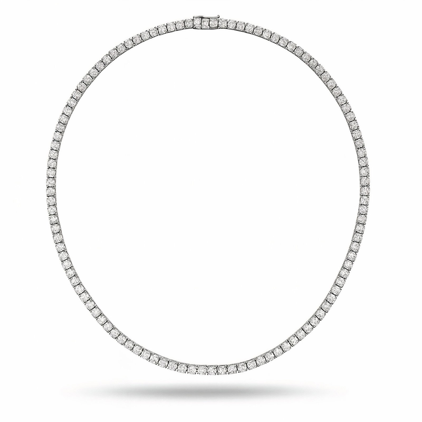 Lab Grown Diamond Tennis Necklace 16 Carats 14K White Gold E-F VVS2-VS1: Lab Grown diamond tennis necklace featuring 118 Round Brilliants weighing 16.14 carats in a four prong Setting, 14 Karat White Gold. Average Diamond 0.14 Points. Color E-F Clarity VVS2-VS1