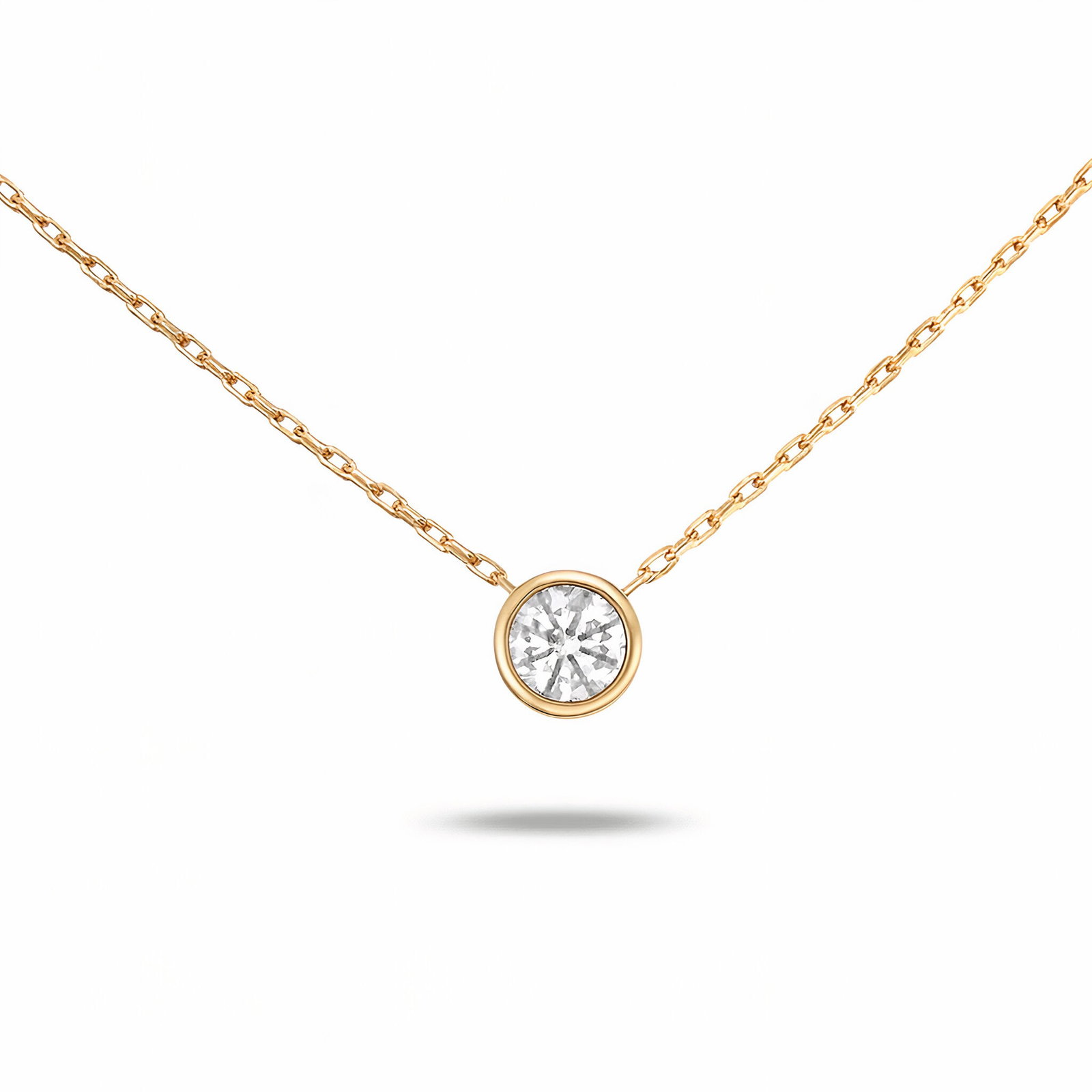 Lab Grown Solitare Round Brilliant Diamond Pendant Necklace 0.90 Carats E-F VS1: Lab Grown diamond pendant featuring one Round Brilliant weighing 0.90 carats in a bezel setting, 14 Karat yellow gold. Color E-F Clarity VS1